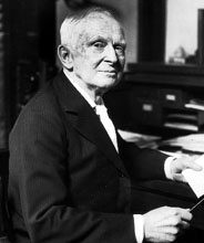 Charles Fillmore at his desk creating this collection