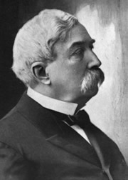 Thomson Jay Hudson at his desk creating this collection