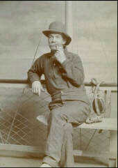 Prentice Mulford at his desk creating this collection